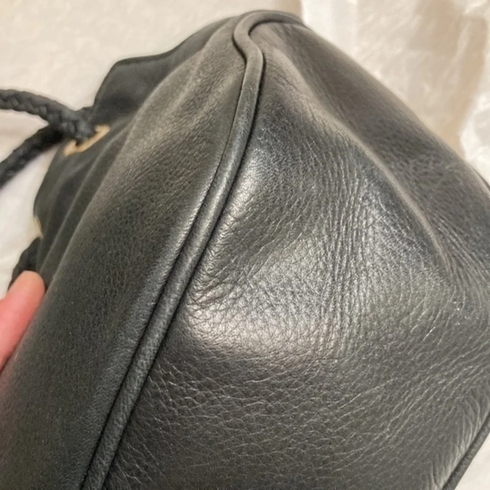 Michael kors mini black leather drawstring bag
